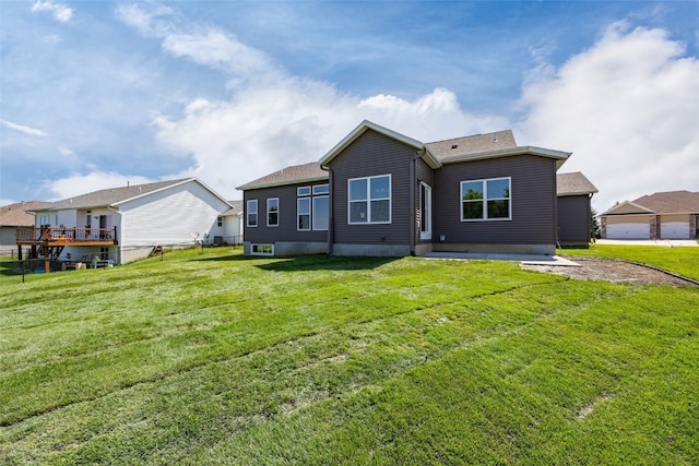 750 Hampshire Dr, Marion, IA 52302 - back of house featuring a lawn