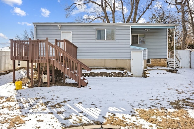 view of snow covered house