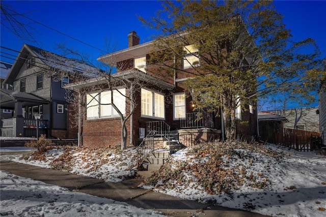 view of snow covered property