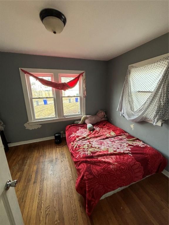 bedroom featuring hardwood / wood-style floors