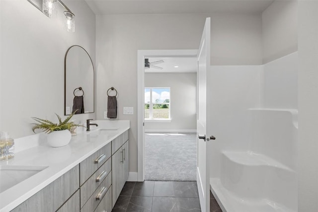 bathroom with vanity and tile patterned floors