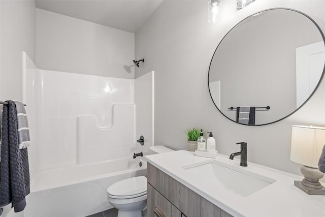 full bathroom with shower / tub combination, vanity, and toilet