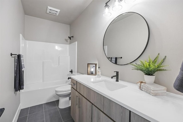 full bathroom featuring vanity, tile patterned floors, toilet, and shower / washtub combination