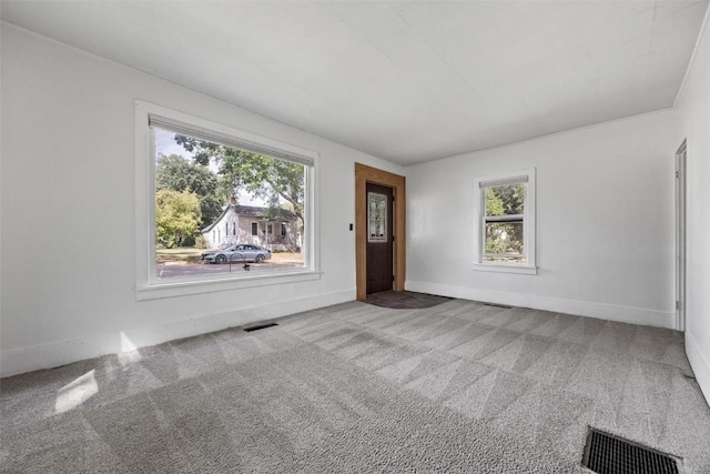 unfurnished room with carpet