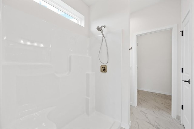 bathroom with a shower