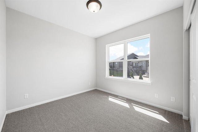 8908 Norway Dr NE, Cedar Rapids, IA 52402 - unfurnished room featuring carpet and baseboards