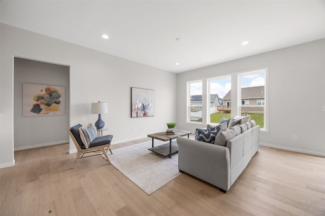 8908 Norway Dr NE, Cedar Rapids, IA 52402 - living room featuring light wood-type flooring, baseboards, and recessed lighting