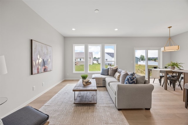 8908 Norway Dr NE, Cedar Rapids, IA 52402 - living room with light wood-style floors, recessed lighting, and baseboards