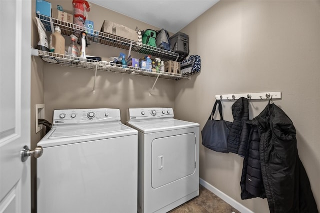 laundry area with washing machine and dryer