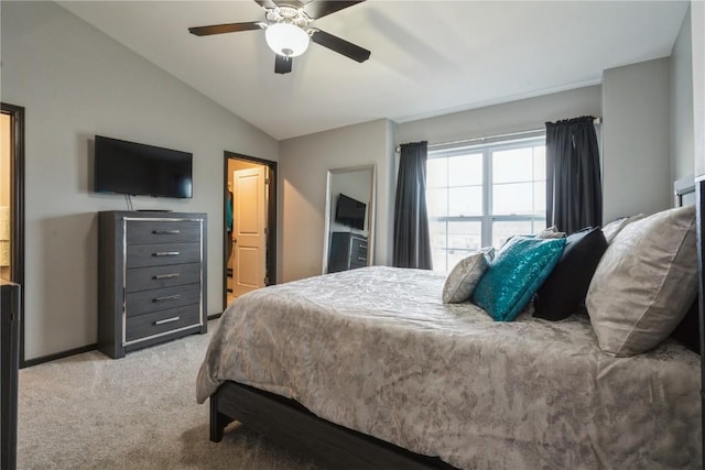 carpeted bedroom featuring lofted ceiling and ceiling fan