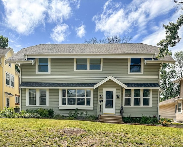 front facade with central AC and a front lawn