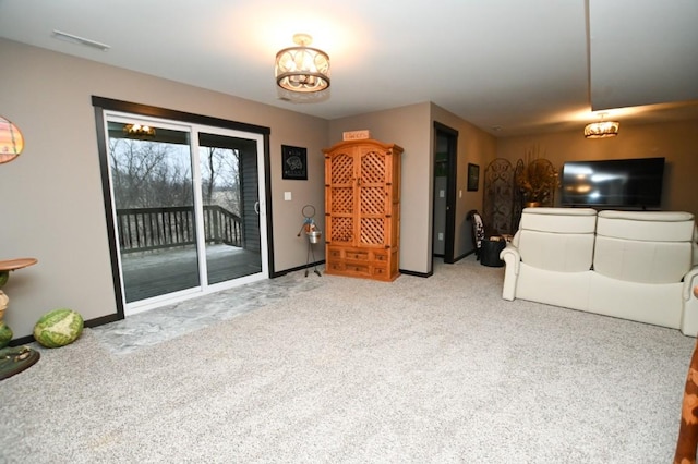 unfurnished living room featuring light carpet