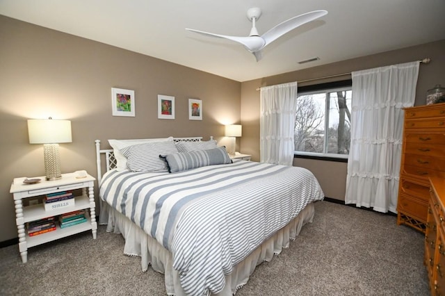 bedroom with ceiling fan and carpet