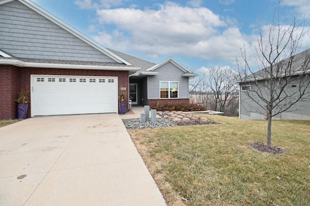 view of front facade featuring a garage and a front lawn