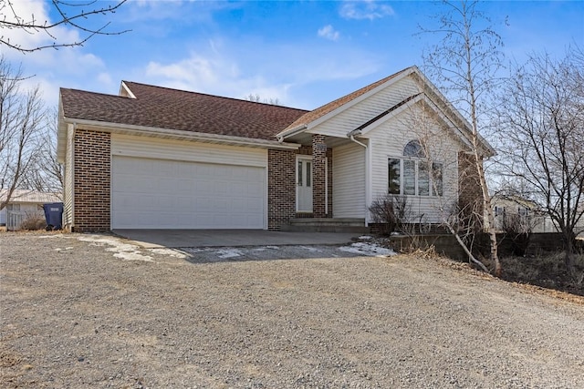 ranch-style house featuring a garage