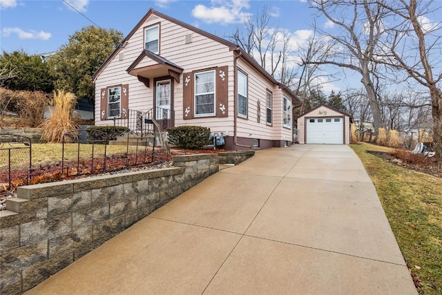 view of front of house with an outbuilding and a garage