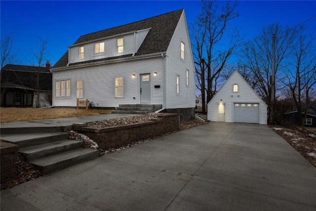 exterior space with a garage and an outdoor structure