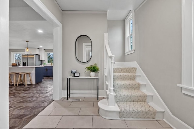 entrance foyer with light tile patterned floors