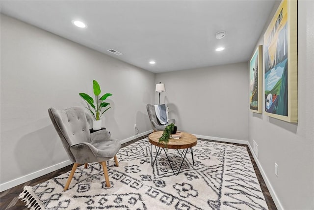 sitting room featuring hardwood / wood-style floors