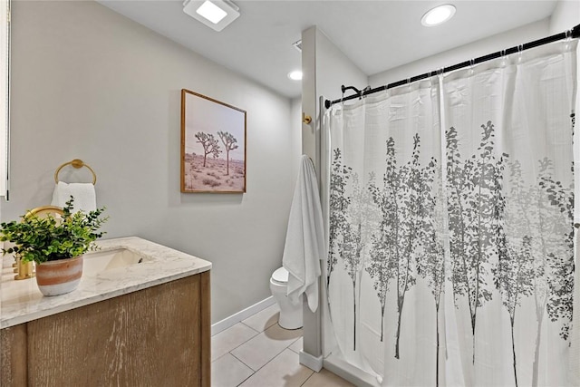 bathroom with a shower with curtain, tile patterned floors, toilet, and vanity