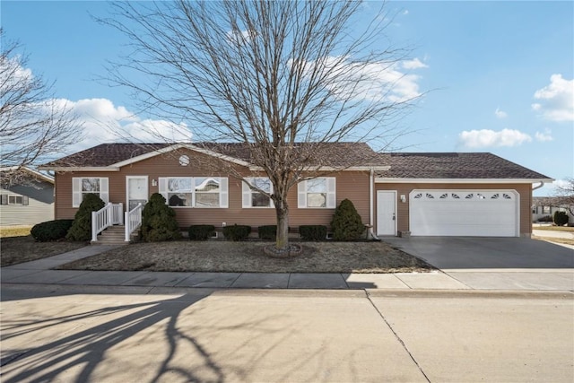 single story home with a garage