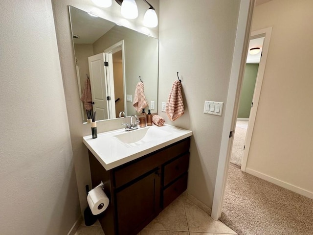 bathroom with vanity and tile patterned flooring