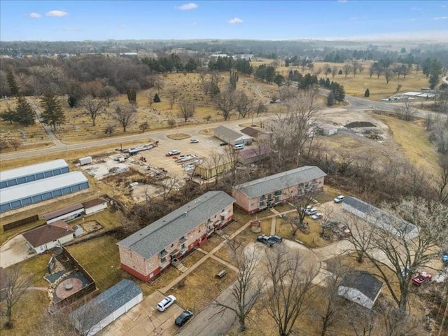 birds eye view of property featuring a rural view