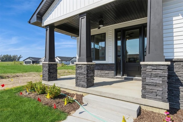 view of exterior entry featuring a porch