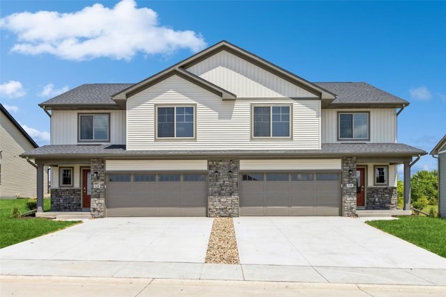 craftsman-style home with a garage and a porch