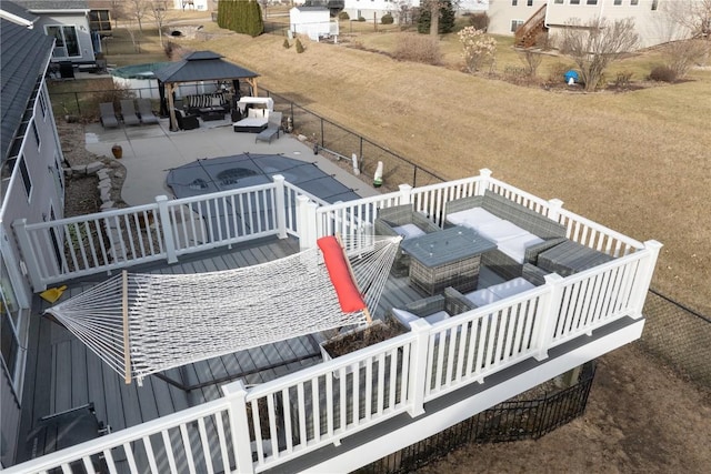 deck with a gazebo and a patio