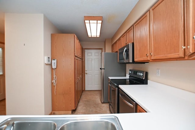 kitchen with sink and stainless steel appliances