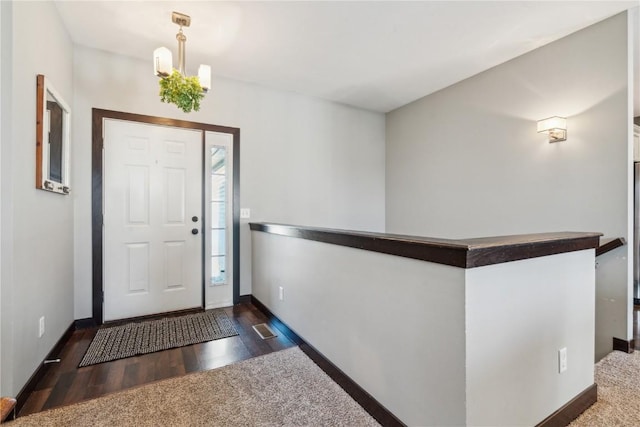 foyer featuring dark hardwood / wood-style floors