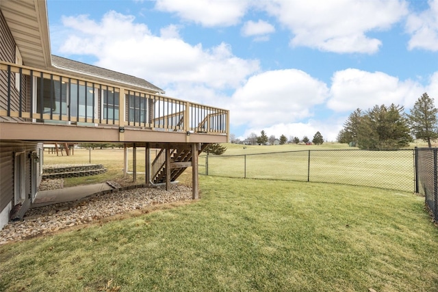 view of yard featuring a deck and a rural view