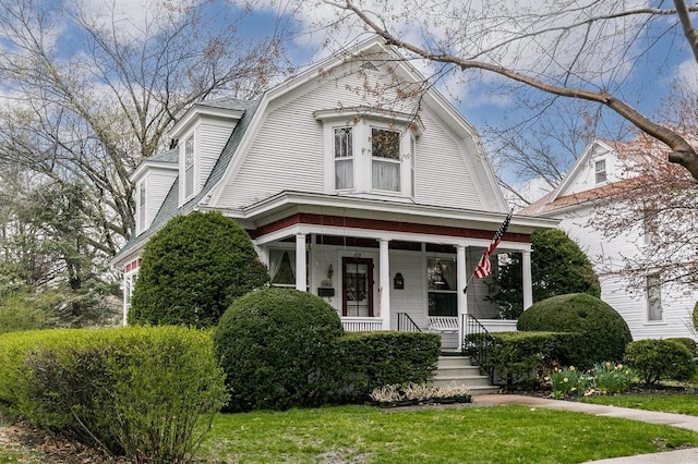 view of front of home featuring covered porch