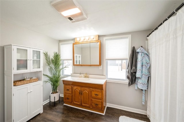 bathroom featuring vanity and hardwood / wood-style flooring