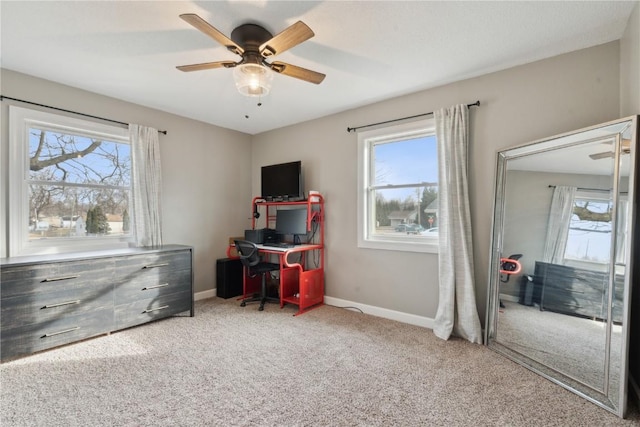 bedroom with multiple windows, carpet flooring, and ceiling fan