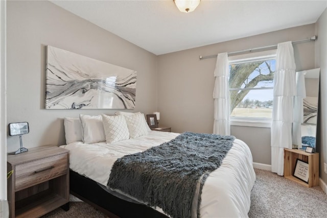 bedroom featuring carpet