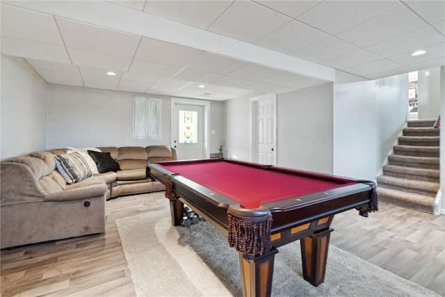 playroom with billiards, a drop ceiling, and light hardwood / wood-style flooring