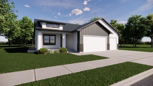 view of front of house featuring a garage and a front yard