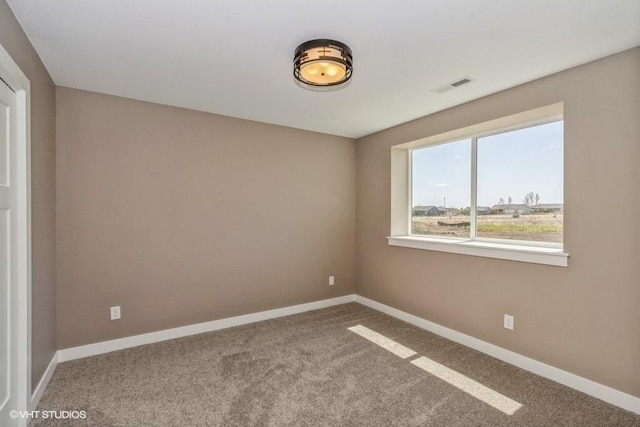 view of carpeted spare room