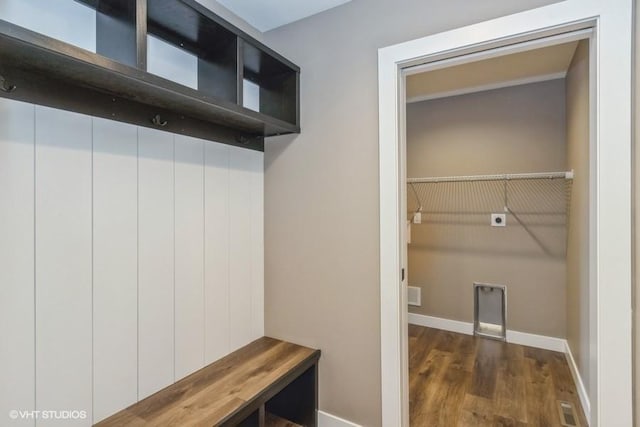 mudroom with dark wood-type flooring