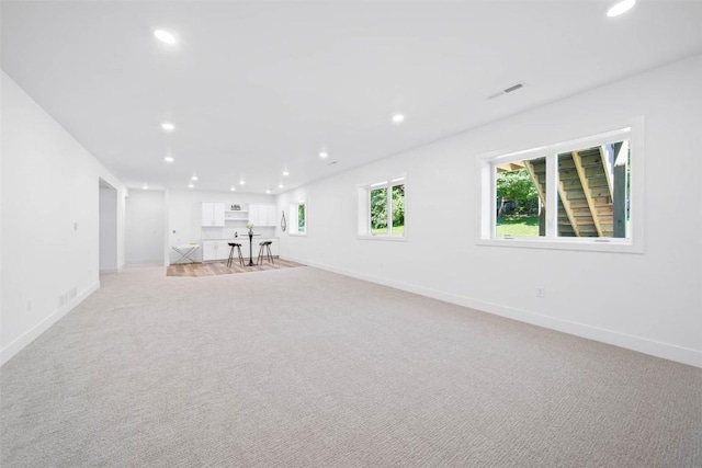 basement with light carpet