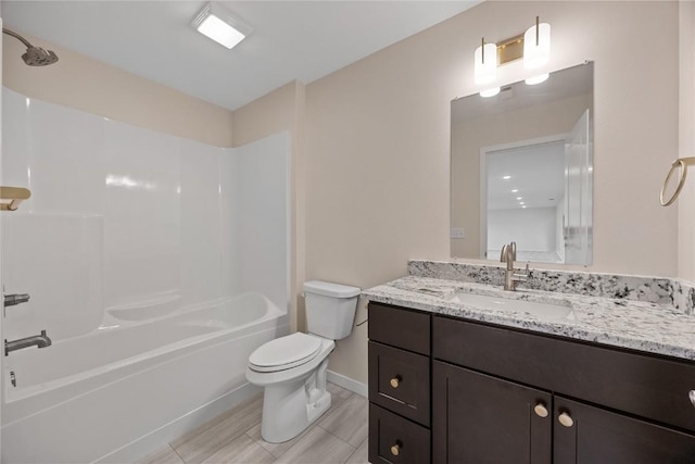 full bathroom with vanity, shower / washtub combination, and toilet