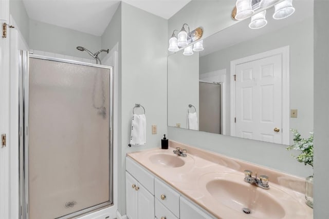 bathroom with vanity and walk in shower