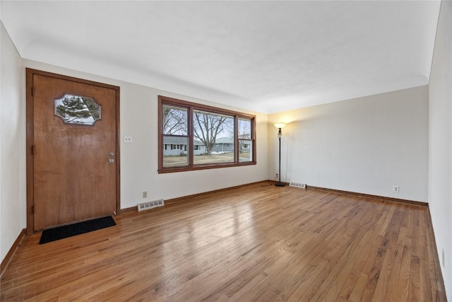 entrance foyer with light wood-type flooring