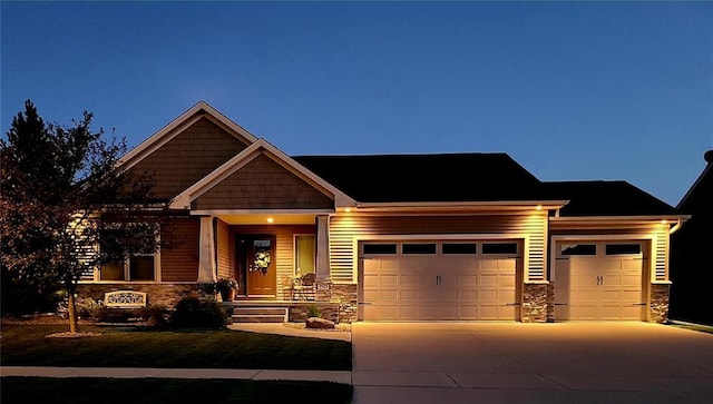 craftsman house featuring a garage