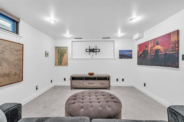 living area with light carpet