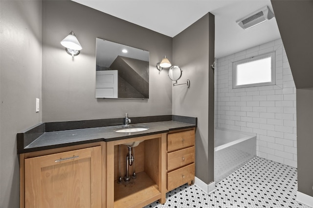 bathroom with vanity, tile patterned flooring, and separate shower and tub