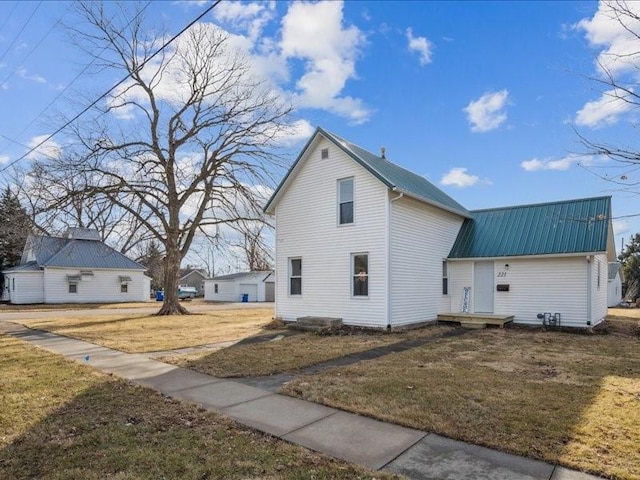 exterior space with a front lawn