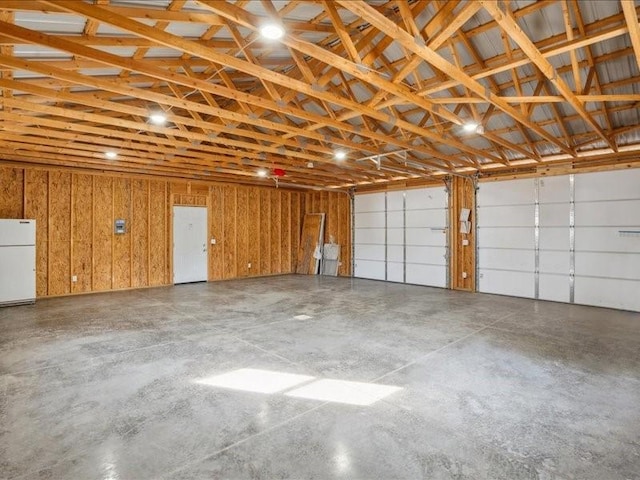 garage featuring white fridge